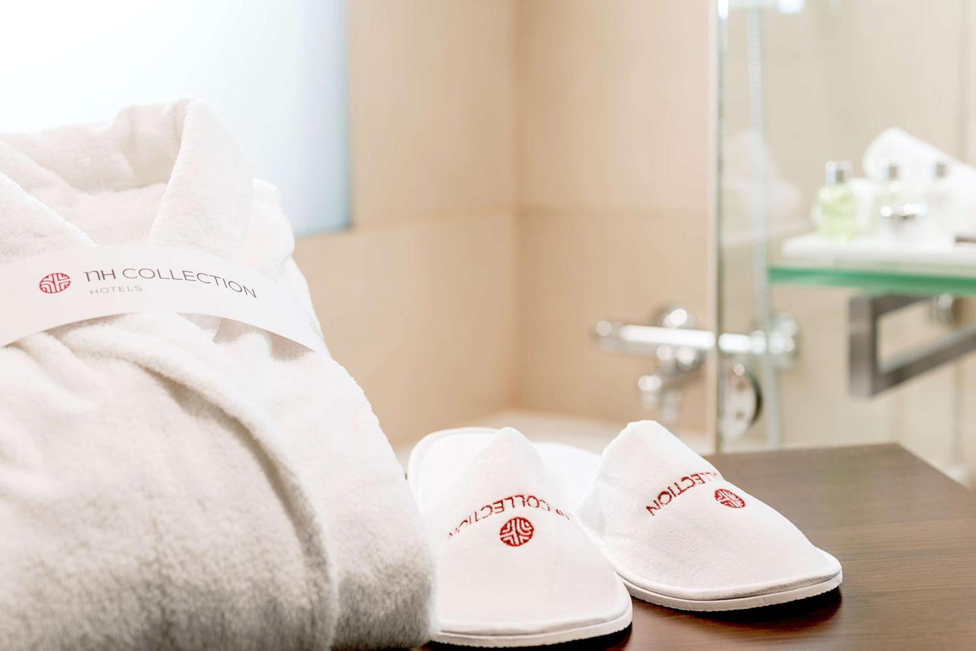 Nh Collection Palazzo Verona Exteriör bild A pair of hotel slippers